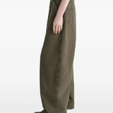 Brown pants worn by a person, showing the pants fit