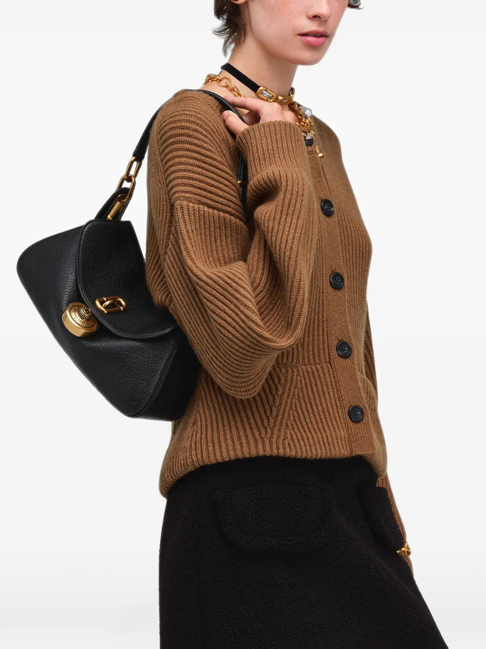 Black bag worn by a person, showing the bag fit