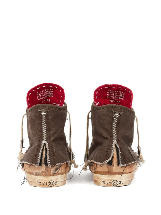 Brown sneakers, back view