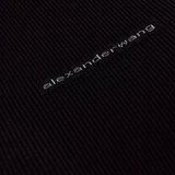 Close up of black top, showing texture of the cotton  fabric