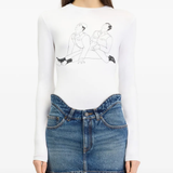 White top worn by a person, showing the top fit