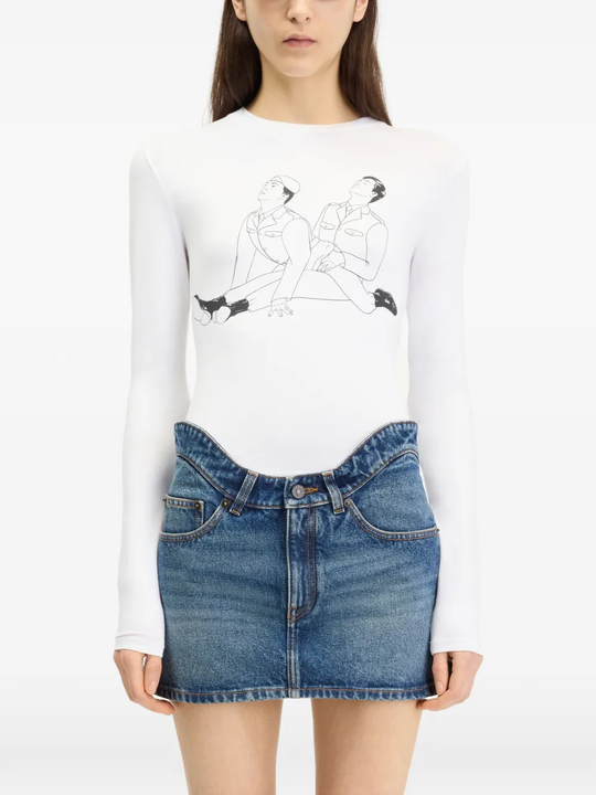 White top worn by a person, showing the top fit