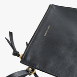 Close up of black bags, showing texture of the viscose fabric