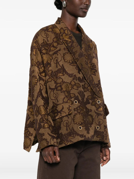 Brown jacket worn by a person, showing the jacket fit