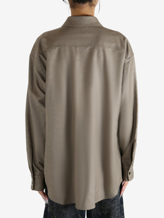 Brown shirt worn by a person, showing the shirt's fit