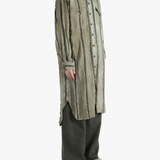 Grey top worn by a person, showing the top's fit