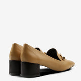 Tan shoes, side view