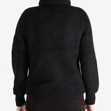 Black jacket worn by a person, showing the jacket fit