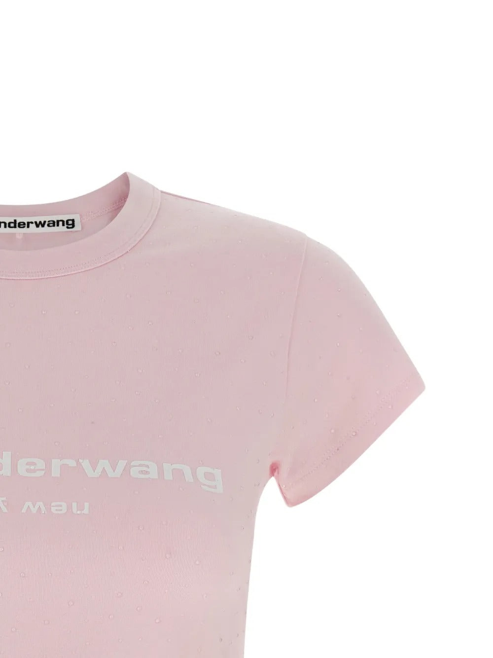 Close up pink t-shirt, showing texture of the cotton fabric