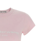Close up pink t-shirt, showing texture of the cotton fabric