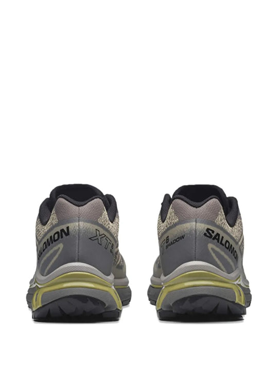 Grey sneakers, back view