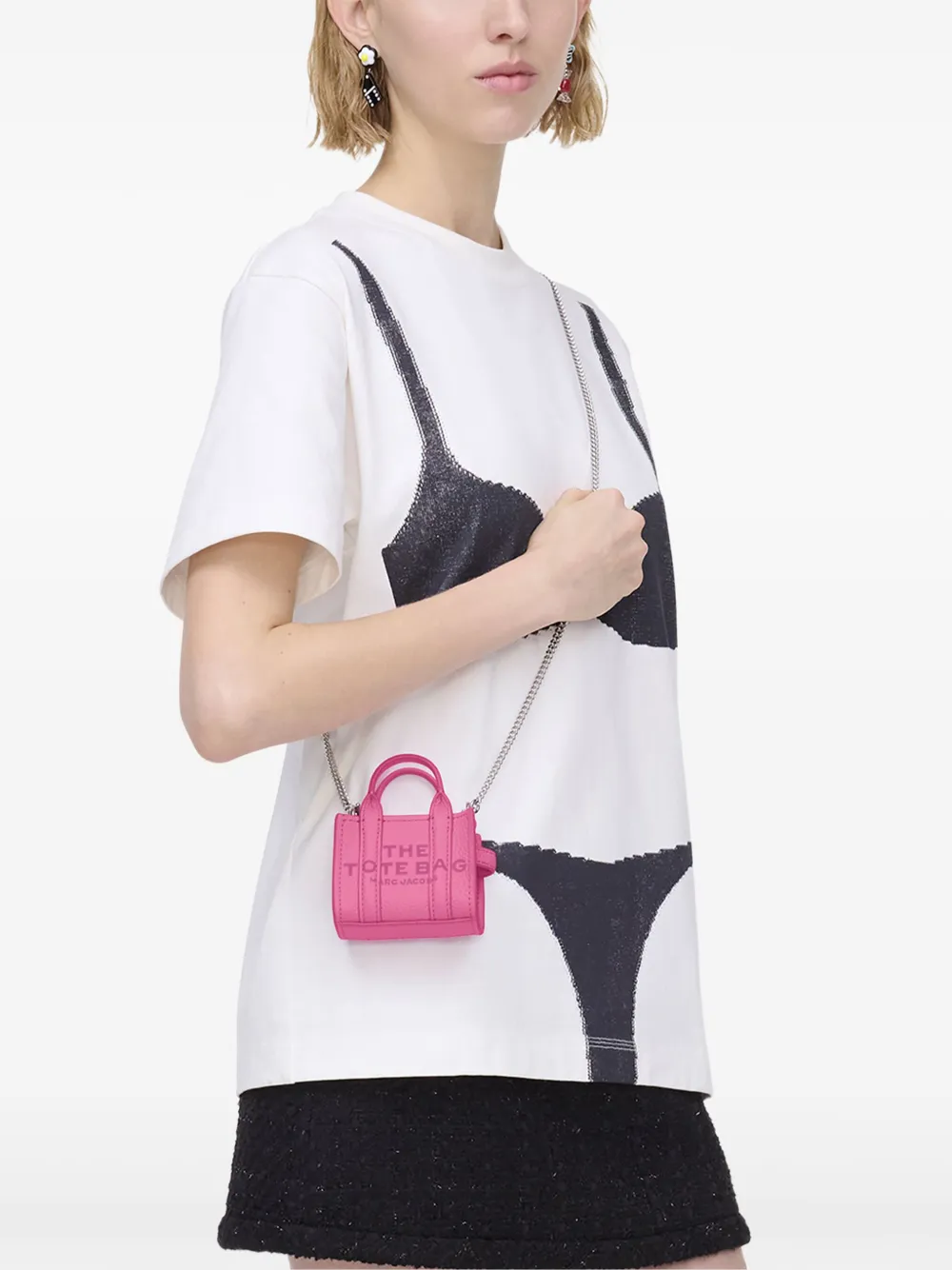 Pink bag worn by a person, showing the bag fit