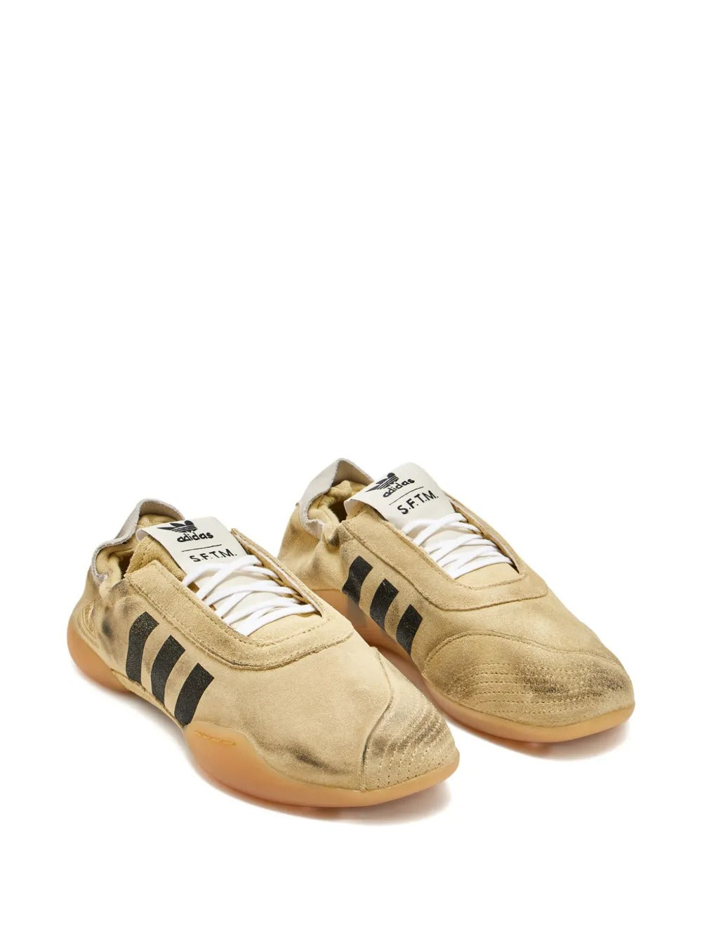 Tan sneakers, side view