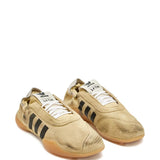 Tan sneakers, side view