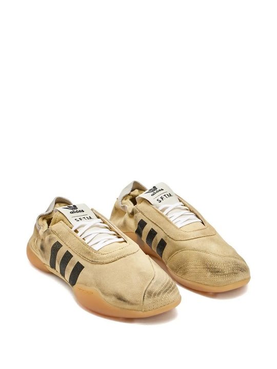 Tan sneakers, side view