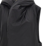 Black coat  worn by a person, showing the coat's fit