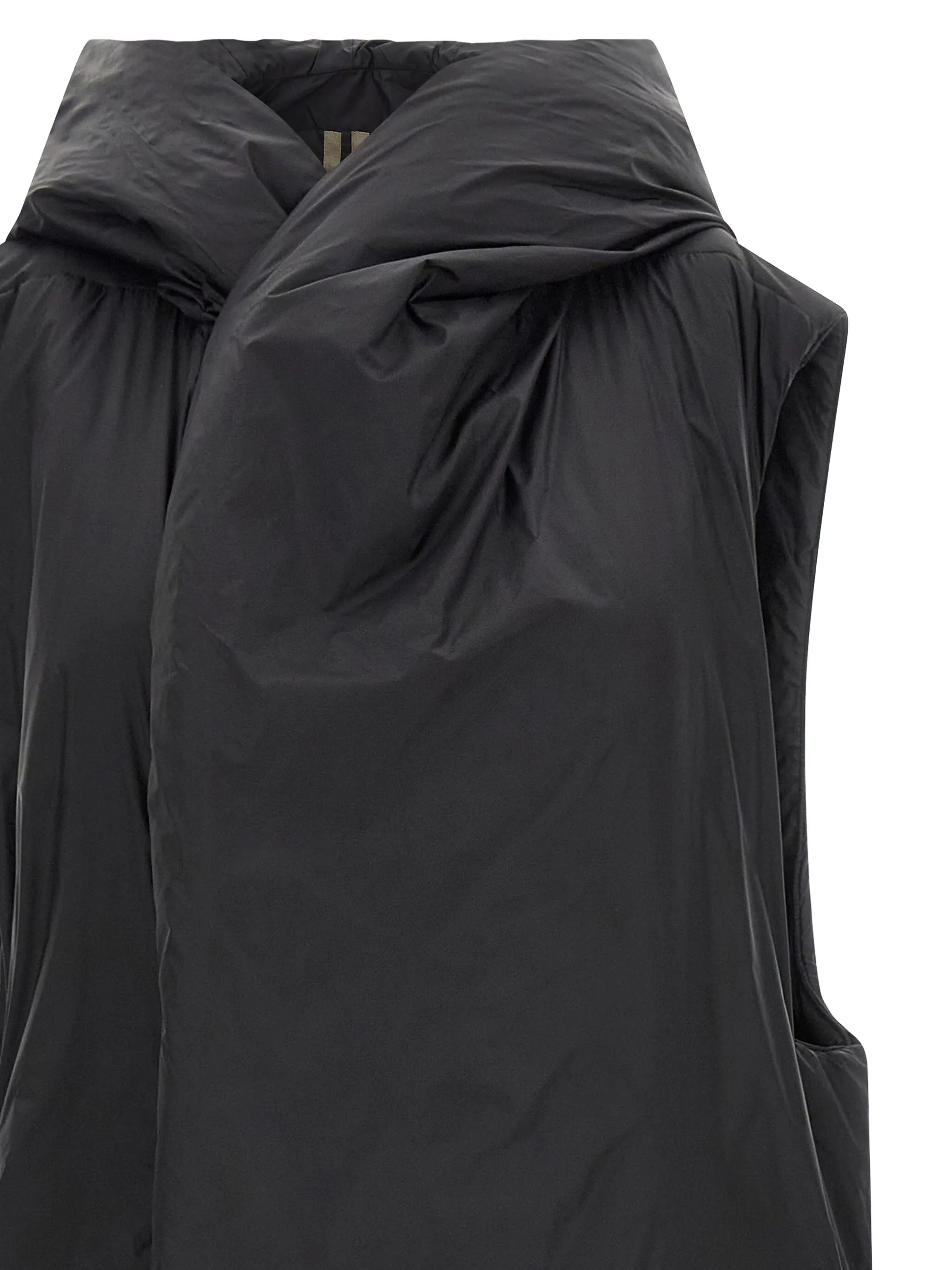 Black coat  worn by a person, showing the coat's fit