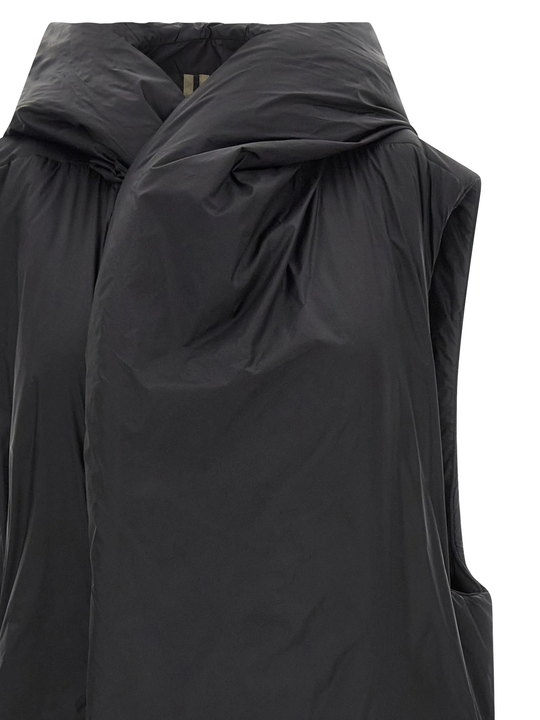 Black coat  worn by a person, showing the coat's fit