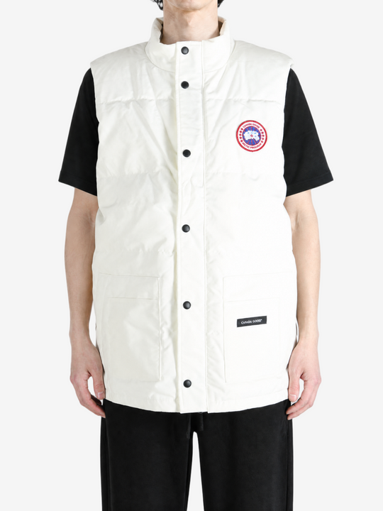 White jacket worn by a person, showing the jacket fit