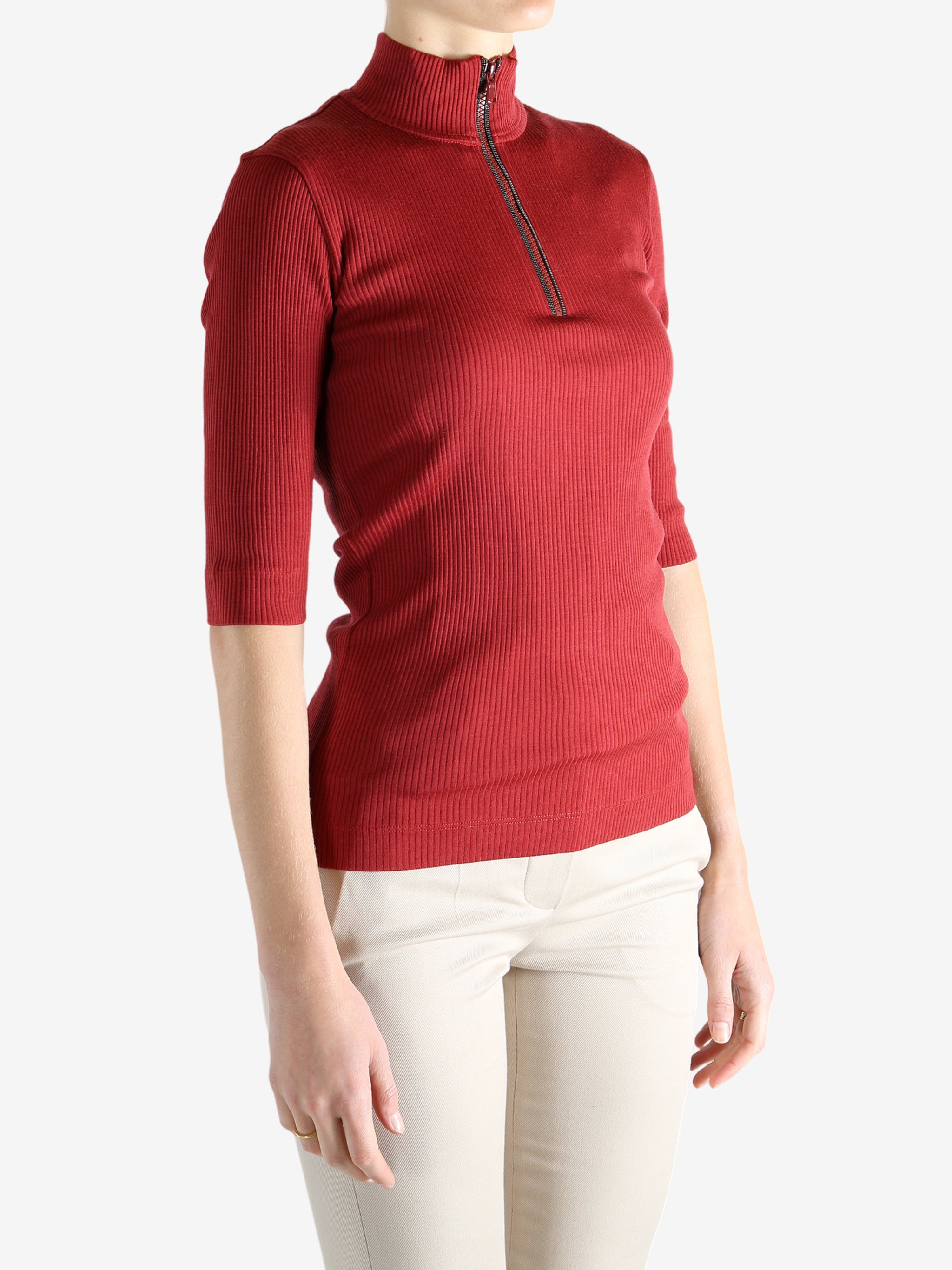 Red shirts worn by a person, showing the shirts fit