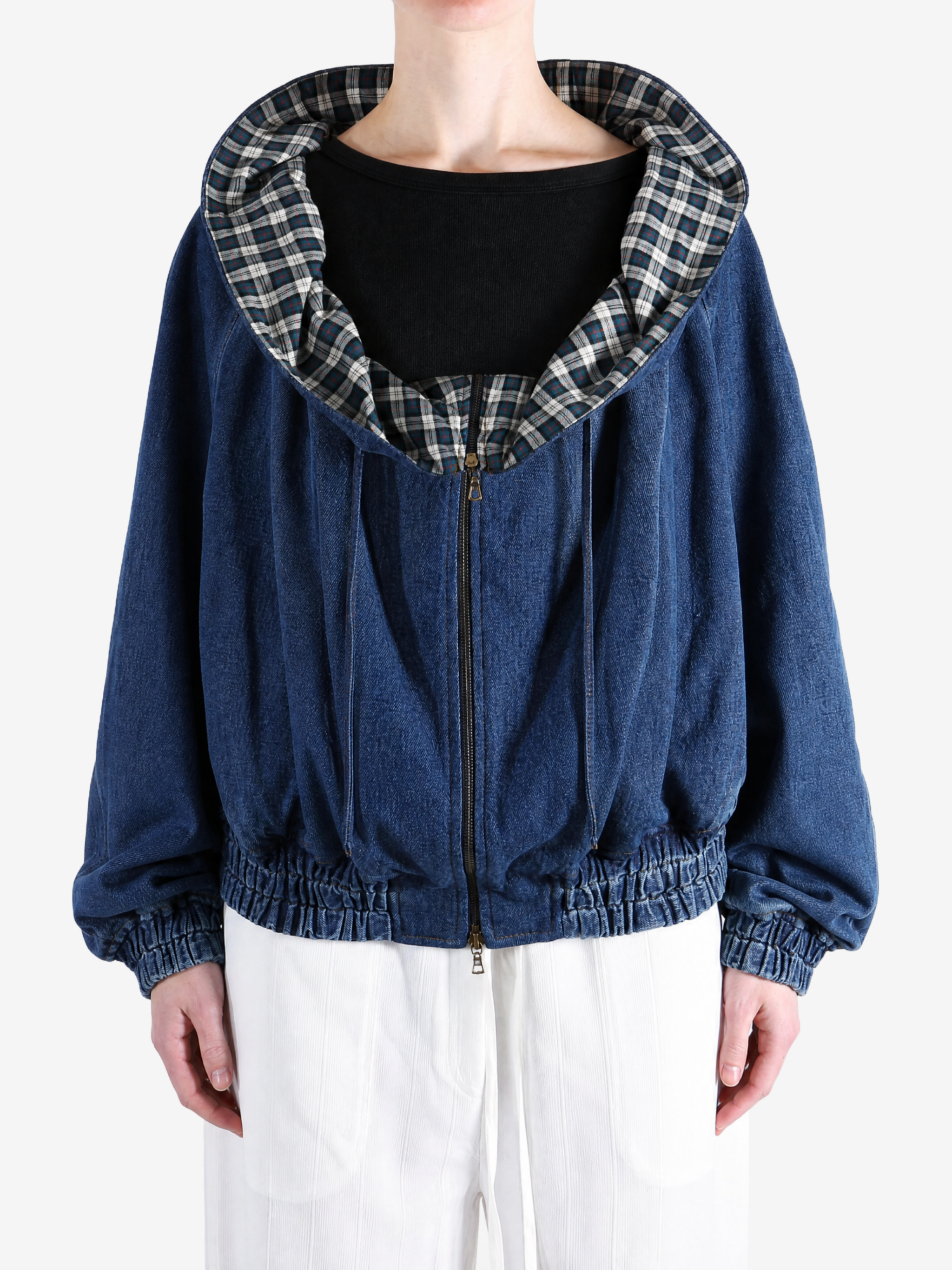 Blue jacket worn by a person, showing the jacket fit