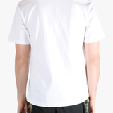 White t-shirt worn by a person, showing the shirt's fit