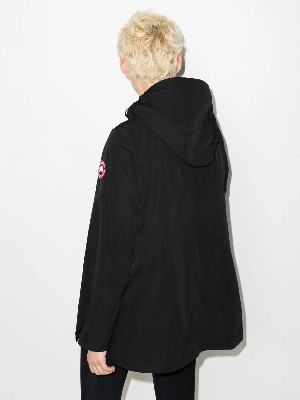 Black jackets worn by a person, showing the jackets fit