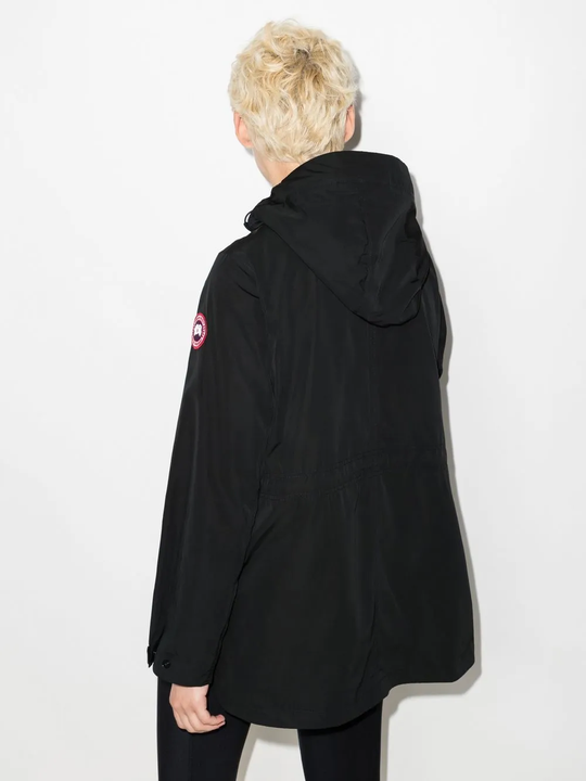 Black jackets worn by a person, showing the jackets fit