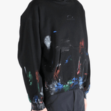 Black hoodie worn by a person, showing the  hoodies fit