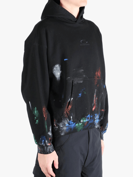 Black hoodie worn by a person, showing the  hoodies fit