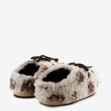 White Mules, back view