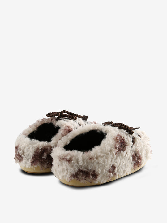 White Mules, back view