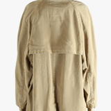 Tan jackets-coats worn by a person, showing the jackets-coats'fit