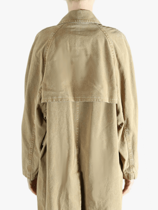 Tan jackets-coats worn by a person, showing the jackets-coats'fit