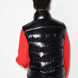 Black jacket worn by a person, showing the jacket fit