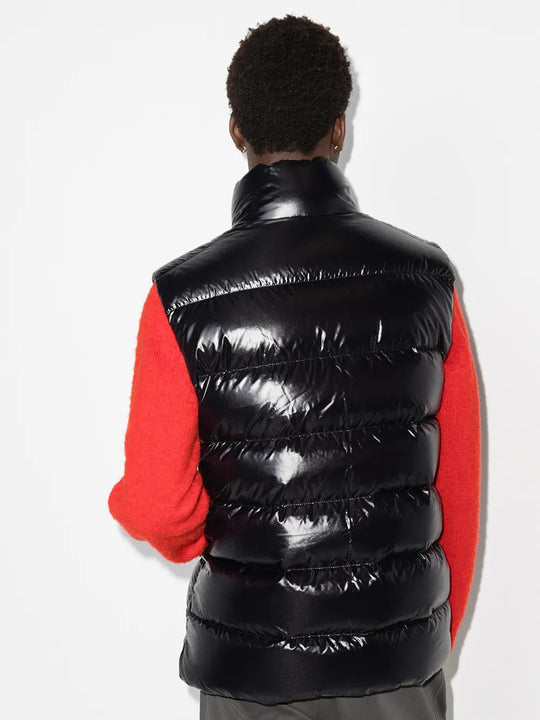 Black jacket worn by a person, showing the jacket fit
