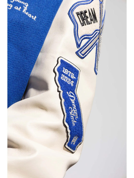 Close up of Blue jacket, showing texture of the 75% wool/ 25% nylon fabric