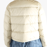 Tan jacket worn by a person, showing the jacket's fit