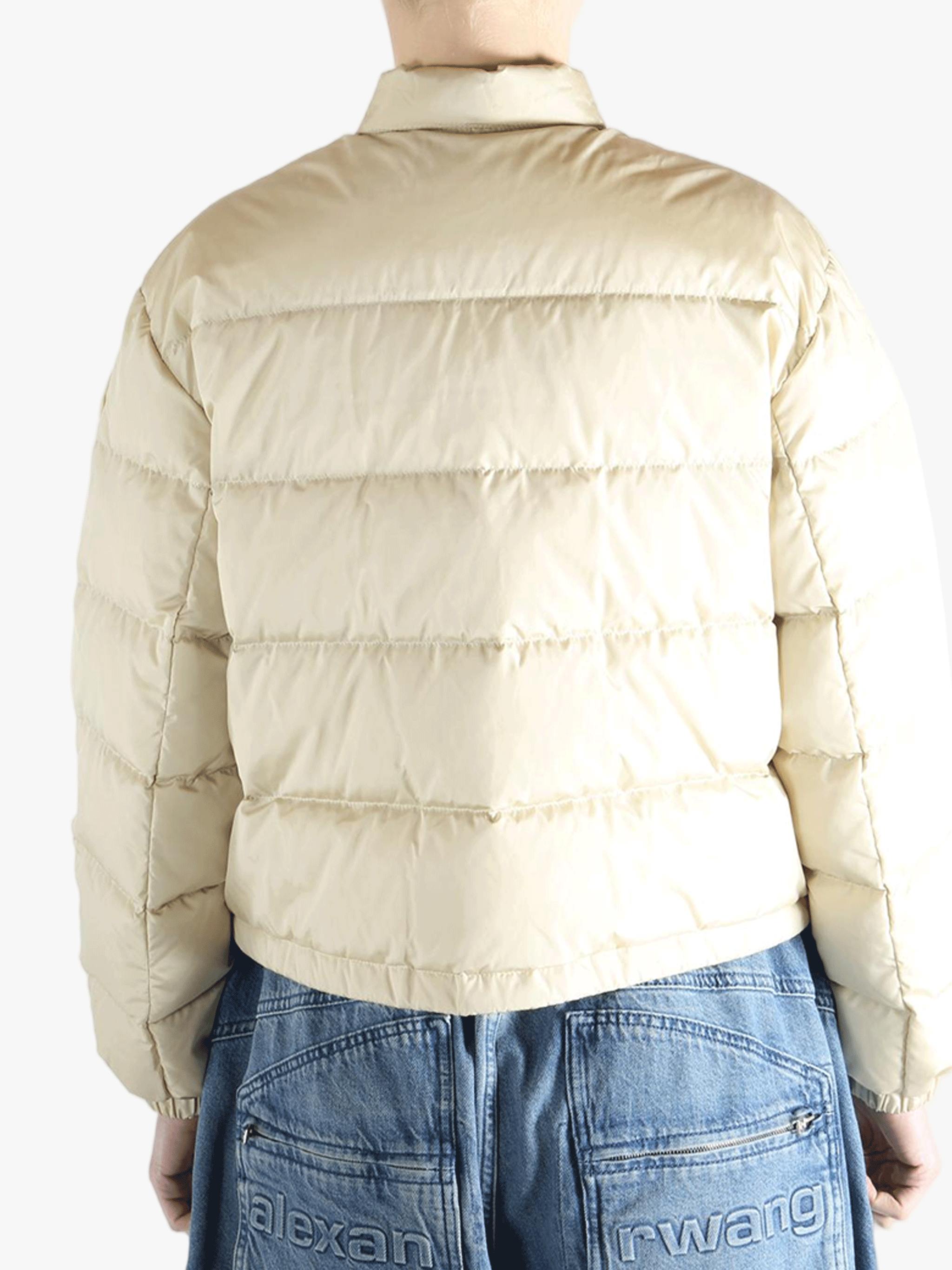 Tan jacket worn by a person, showing the jacket's fit