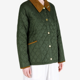 Green jacket worn by a person, showing the jacket fit
