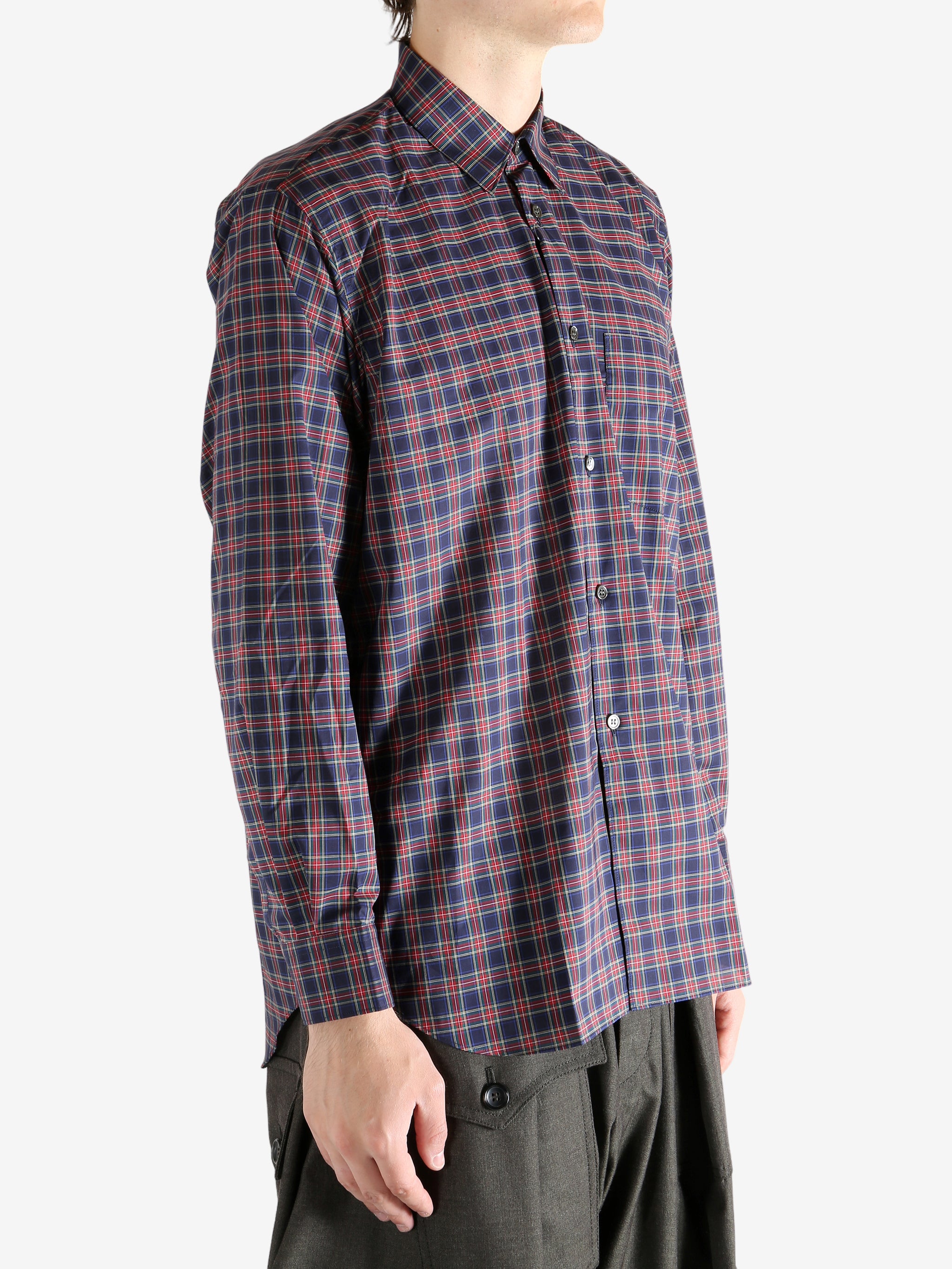 red shirt worn by a person, showing the shirt's fit