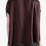Burgundy top worn by a person, showing the top's fit