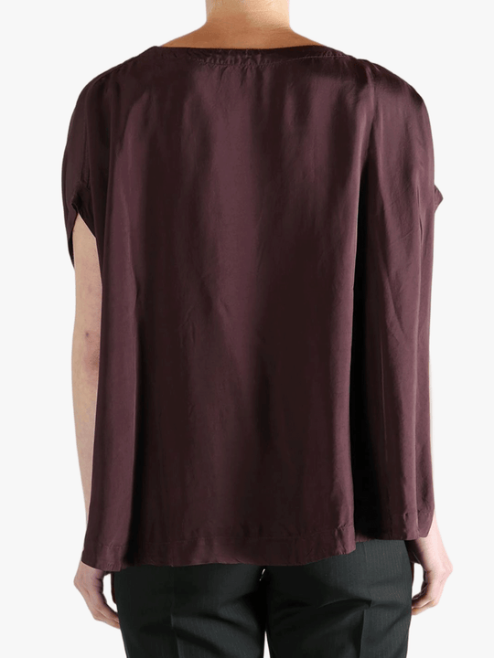 Burgundy top worn by a person, showing the top's fit