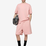 Pink shorts, full body view