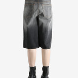 Black shorts worn by a person, showing the shorts's fit