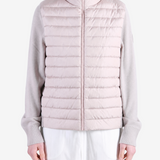 Pink jacket worn by a person, showing the jacket fit