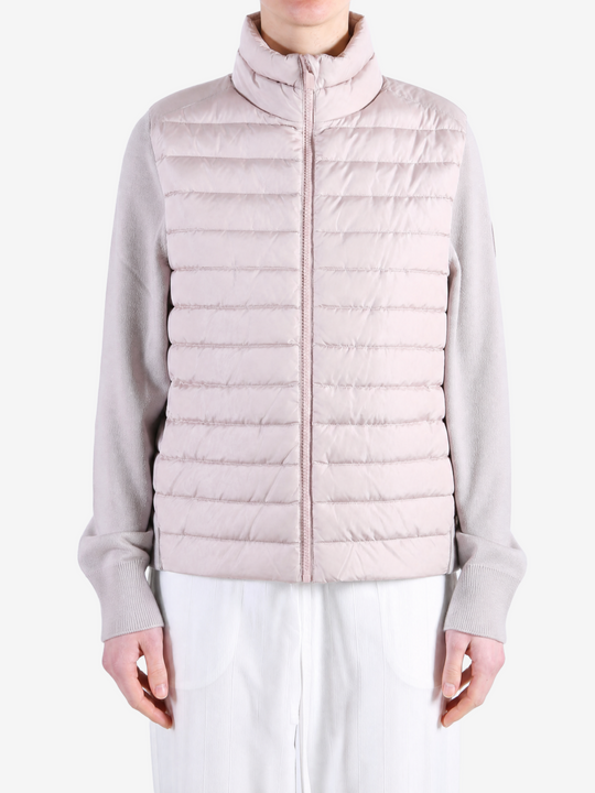 Pink jacket worn by a person, showing the jacket fit