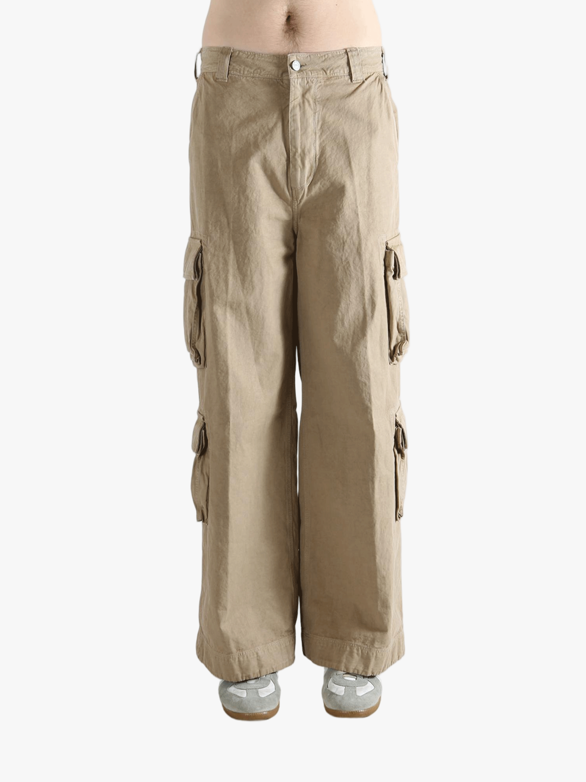 Brown pants worn by a person, showing the pants' fit
