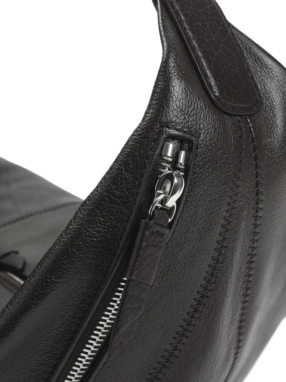 close up of black bags, showing texture of the cow leather fabric