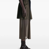 Brown skirt worn by a person, showing the skirt fit